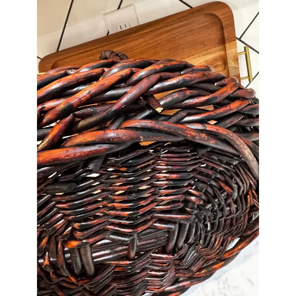 dark stained willow basket rustic handwoven texture sturdy center handle vintage